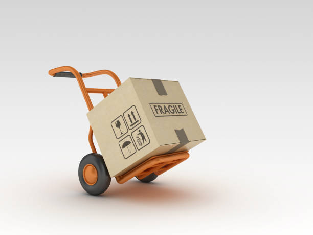 istock Hand Truck and Cardboard Box - 3D Rendering 1216855214