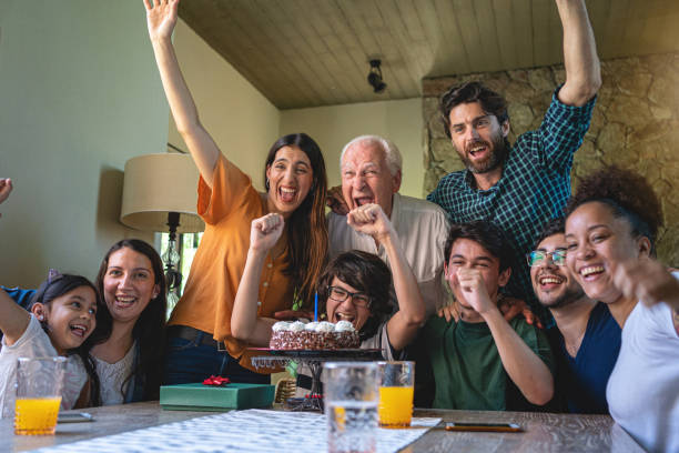 istock Ecstatic family celebrating birthday 1216857713