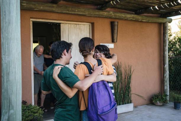 istock Woman returning home from a study trip 1216857755