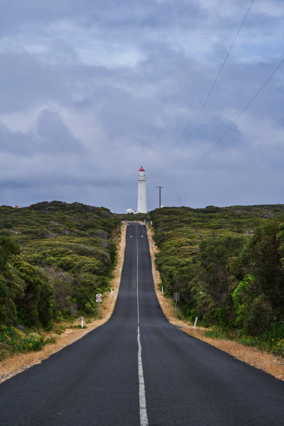 Tight shot of the Cape Nelson Lighthouse near Portland on a cloudy day, Victoria, Australia; more vivid color edit