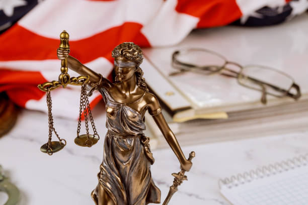 istock Lawyer business working notary signs the documents at office 1216860871