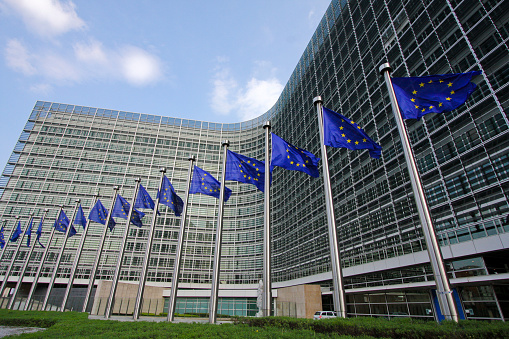 Strasbourg, France - November 11, 2023: The building of the European Parliament (The Louise Weiss Building) in Strasbourg, Bas-Rhin, Alsace, France. The famous glass facade in the light of a sunny november day.