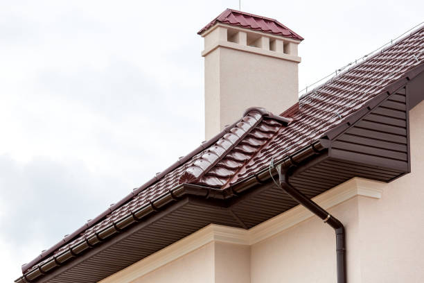 istock a brown rooftop of a ceramic tile with a pipe a storm drainage system and vent pipe, close up details of the architectural structure of a house. 1216864094