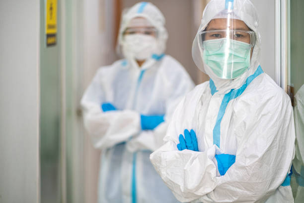 Portrait of Asian female doctor with protective workware or ppe in hospital stock photo