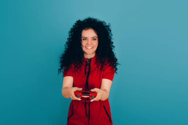 istock girl plays video games 1216869651