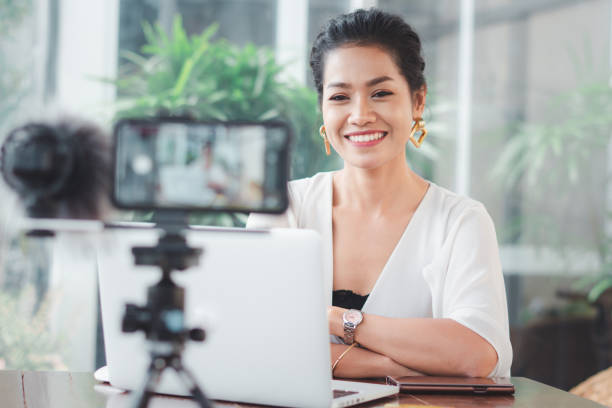 istock Young student woman use wireless internet learning and co-working at home on mobile tablet app. Modern girl people blogger couch on laptop education classroom online device, Social distancing in space 1216869819