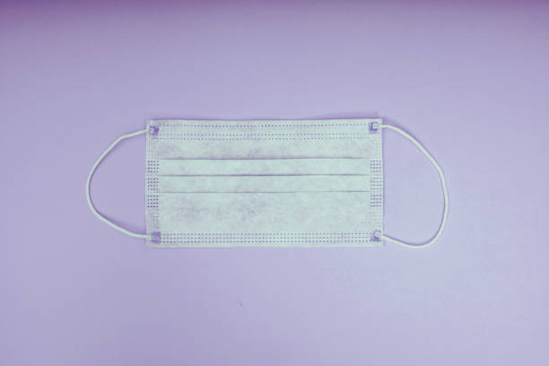 istock Protective medical mask. Personal protective equipment. Coronavirus pandemic. 1216871223