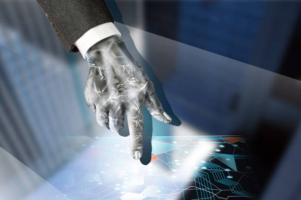 istock A cyborg who analyzes and gives instructions to data in an office district. 1216871252