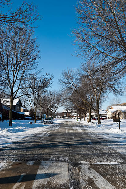 istock Suburb street with snow 121687242