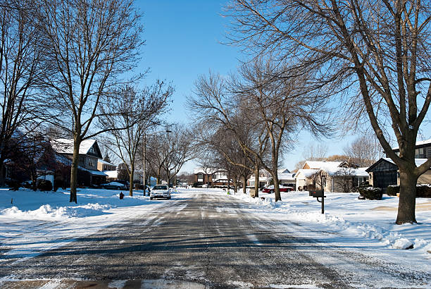 istock Suburb street with snow 121687243