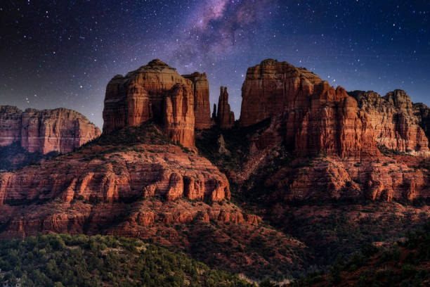Cathedral Rock The Milky Way over Cathedral Rock near Sedona, Arizona. rock formations stock pictures, royalty-free photos & images