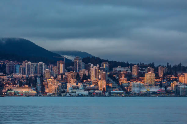 istock sunset light on North Vancouver, BC, Canada 1216885480