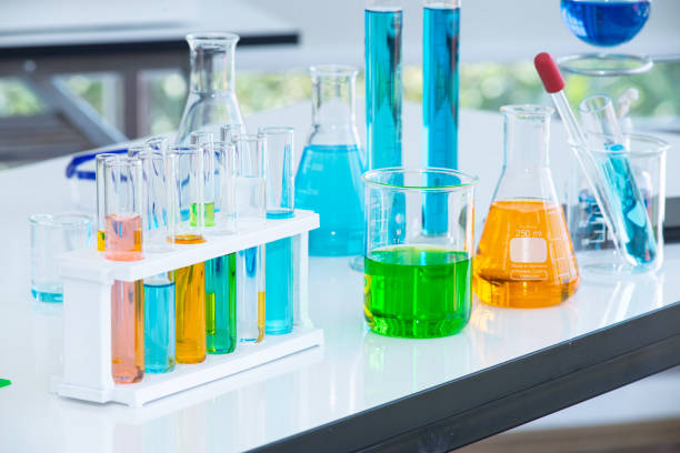 istock Preparing Laboratory equipments such as glassware, tube with liquid on the white table. The chemistry experiment in scientific research 1216892359