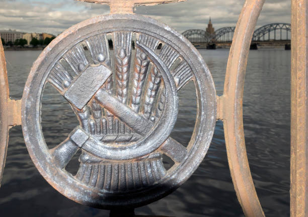 istock Soviet sickle and hammer ornament on Railway Bridge over Daugava River in Riga, Latvia 1216894206