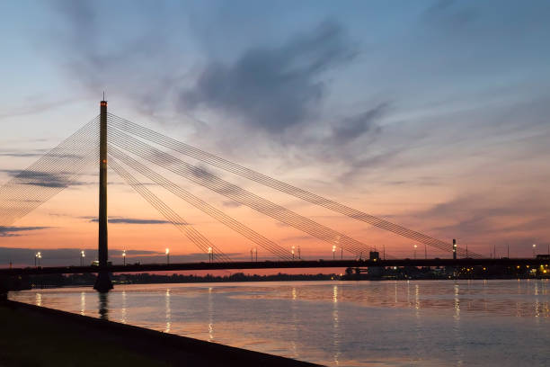 istock Suspension bridge at night. Riga, Latvia 1216894797