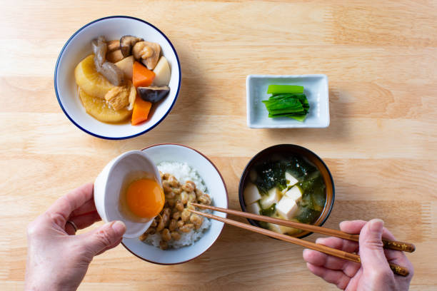istock Japanese food, boiled vegetables, natto, miso soup, raw eggs 1216897143