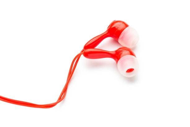 istock Modern wired classic red headphones isolated on white Modern technology concept 1216901393