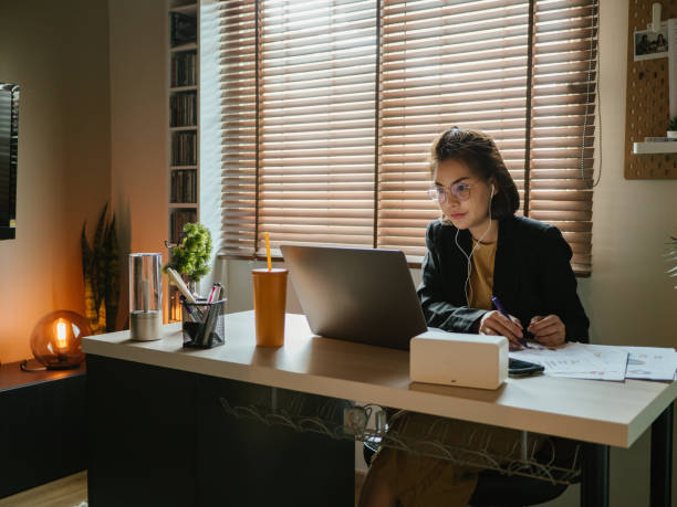 istock Businesswoman working in her modern home office 1216902316
