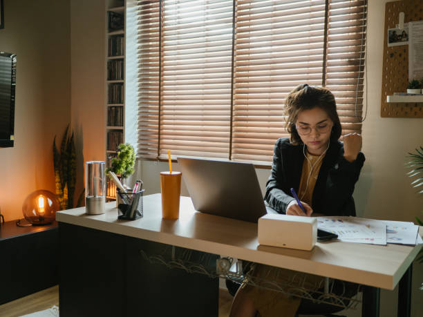 istock Businesswoman working in her modern home office 1216902344