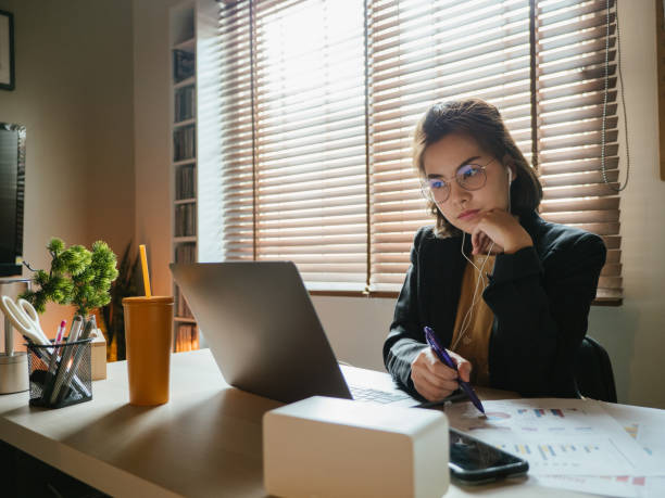 istock Businesswoman working in her modern home office 1216902360