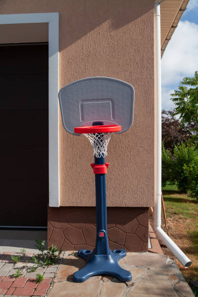 istock Plastic kids basketball game set for home in private courtyard 1216904167