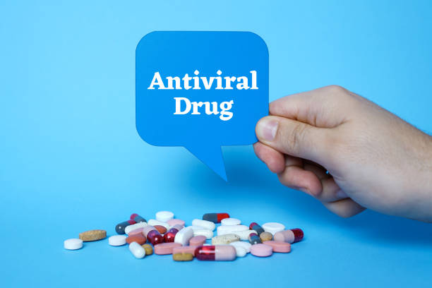 istock Hand holding speech bubble with Antiviral Drug. 1216904950