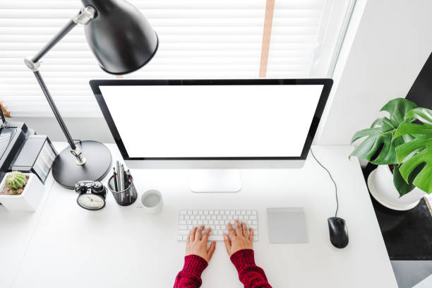 istock Asian woman working from home using computer and drinking coffee in her bedroom document finance and conference online meeting for new projects 1216908233