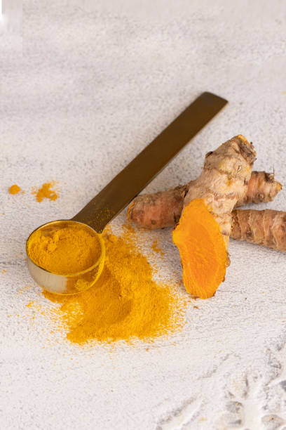 istock Turmeric spice for cooking and alternative medicine 1216910327