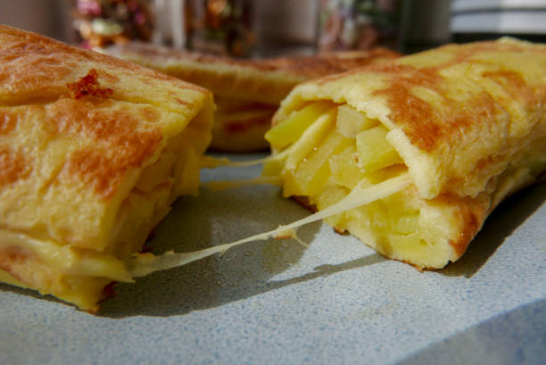 istock homemade breakfast: omelet stuffed with potato and cheese 1216910582