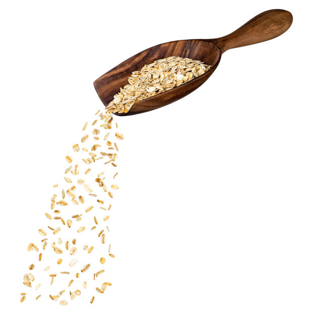 istock oat flakes in wooden scoop 1216910592