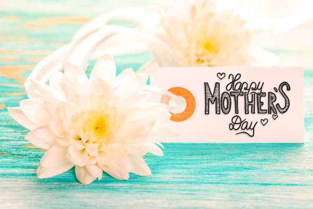istock Label With Calligraphy Happy Mothers Day. White Blossoms 1216911300