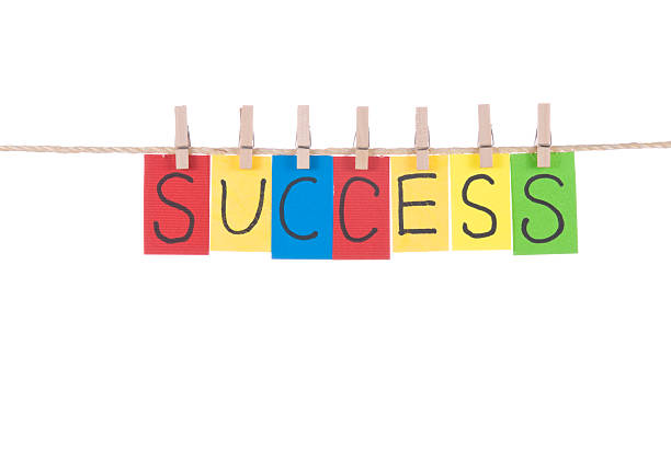 istock Success, words hang by wooden peg 121691185