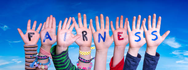 istock Children Hands Building Word Fairness, Blue Sky 1216912477