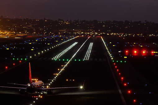 Taken near San Diego International Airport. Shows a plane getting ready to take off