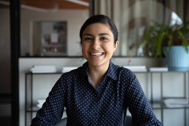 istock Excited young indian ethnicity woman looking at camera. 1216914503
