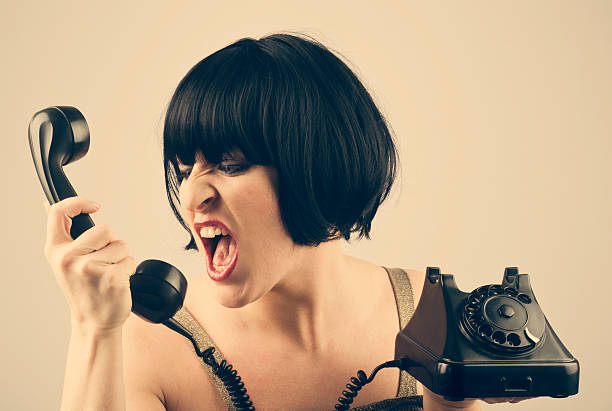 istock Angry Woman on the Phone 121691452