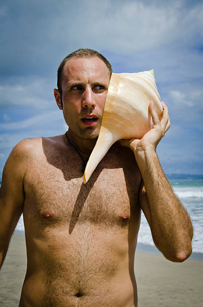 istock Man listening to the Big Shell 121691501