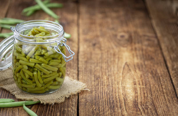 istock Portion of preserved Green Beans (selective focus; close-up shot) 1216915033