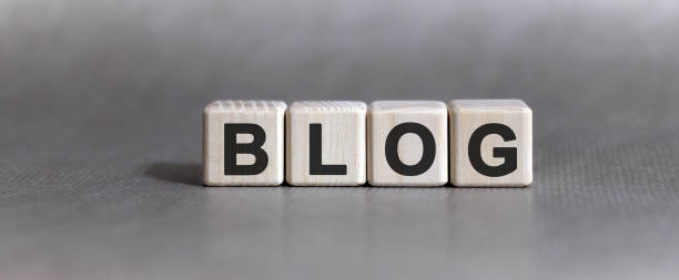 istock BLOG text on wooden cubes on a monochrome background 1216915466