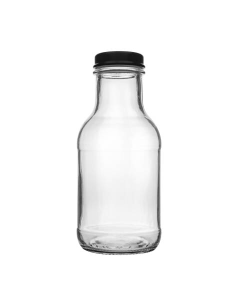 istock Empty transparent glass jar isolated on white 1216915653
