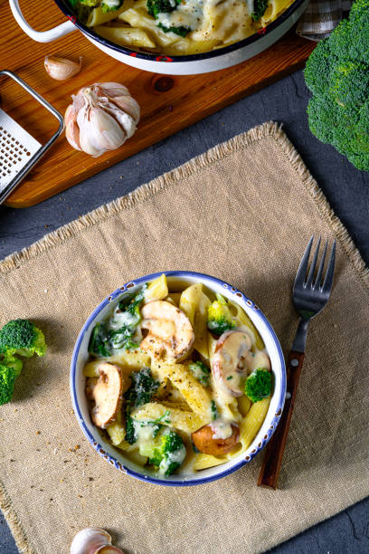 istock Real pasta with mushrooms, spinach and broccoli 1216917669