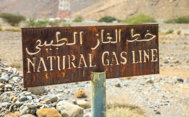 istock rusty sign, natural gas line in the desert 1216918601