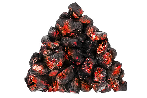 Red hot coal heap on white background isolated close up, orange burning coal stones pile, fossil fuel, black anthracite, glowing coal nuggets on fire, smolder embers pieces, flaming charcoal bonfire