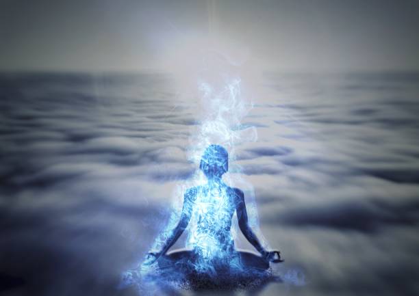 istock Silhouette of a person meditating 1216920958