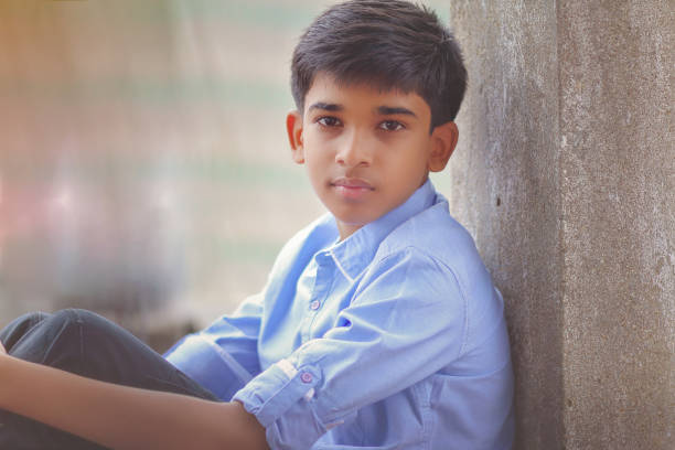 Portrait of Indian boy posing to camera
