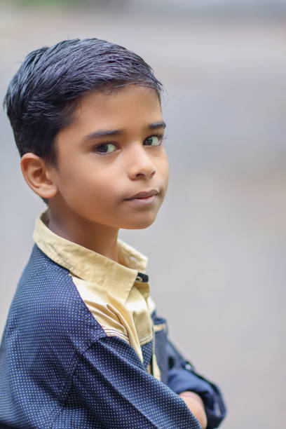 istock Portrait of Indian boy posing to camera 1216924171