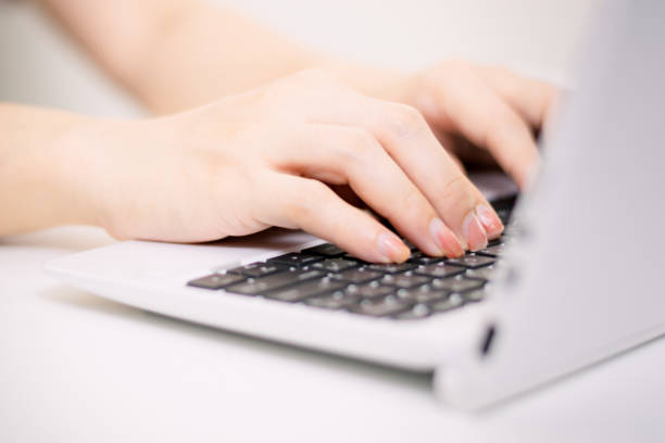 istock Woman hand pressing computer keyboard concept Business working in an office or Work at home 1216924332