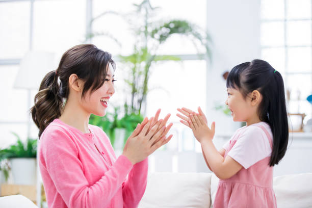 istock Mom teach child wash hands 1216925303