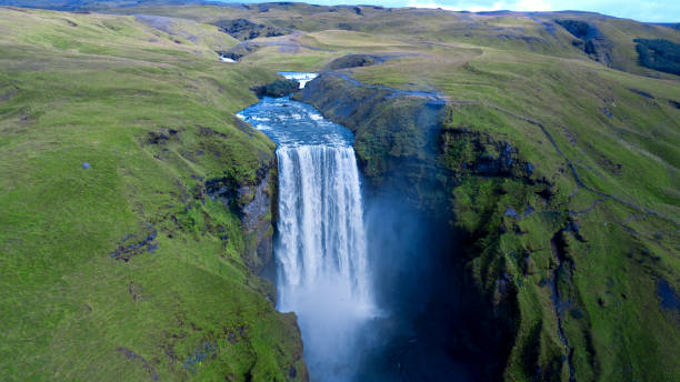 istock spray and waterfall in iceland 1216925778