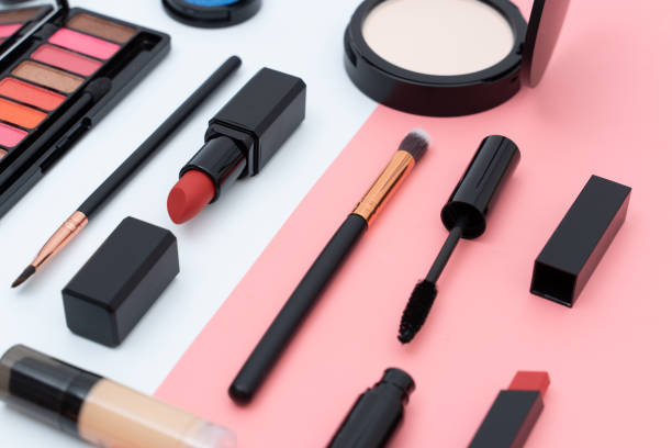 istock set decorative cosmetics on pink and white 1216928140